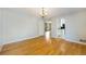Bright dining room with hardwood floors that opens into the kitchen and living room at 291 Magnolia St, Denver, CO 80220