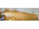 Sun-drenched living room showcasing gleaming hardwood floors, neutral paint, and ample space at 291 Magnolia St, Denver, CO 80220