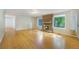 Bright living room boasts a cozy fireplace, hardwood floors, and plenty of natural light at 291 Magnolia St, Denver, CO 80220