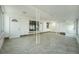 Bright and airy sun room features tile floors, large windows, and multiple entry points at 291 Magnolia St, Denver, CO 80220