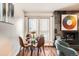 Cozy dining area bathed in natural light, perfect for meals and gatherings at 701 Harlan St # E59, Lakewood, CO 80214