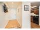Bright entryway leads to the kitchen with modern appliances and ample cabinet space at 701 Harlan St # E59, Lakewood, CO 80214