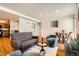Inviting living room with modern decor, fireplace, and an open layout at 701 Harlan St # E59, Lakewood, CO 80214