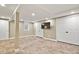 Spacious basement area featuring tile flooring, ample lighting, and plenty of closet space at 7376 S Jackson St, Centennial, CO 80122