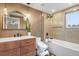Bathroom with modern vanity, glass enclosed shower, and stylish decorative fixtures and tile at 7376 S Jackson St, Centennial, CO 80122