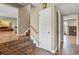 Inviting entryway featuring decorative tile stairs and floors with an open view into other living spaces at 7376 S Jackson St, Centennial, CO 80122