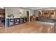 Open floor plan showcases a living room leading to a kitchen and dining area at 7376 S Jackson St, Centennial, CO 80122