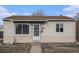 An exterior front view of a one-story home at 7971 Olive St, Commerce City, CO 80022