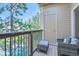 Enjoy relaxing on the balcony featuring a comfortable seating area with outdoor views at 7409 S Alkire St # 304, Littleton, CO 80127