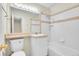 Neat bathroom with combined bathtub and shower, and well-lit mirror above the sink at 8079 Wolff St # A, Westminster, CO 80031