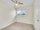 Comfortable bedroom featuring a ceiling fan and plush neutral carpeting at 8079 Wolff St # A, Westminster, CO 80031