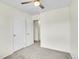 Carpeted bedroom featuring 2 closets, ceiling fan, and fresh paint at 8079 Wolff St # A, Westminster, CO 80031