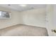 Bright carpeted bedroom featuring a window and bonus built-in wall shelves at 8079 Wolff St # A, Westminster, CO 80031