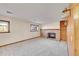 Basement featuring a brick fireplace and shelving at 1244 S Argonne Cir, Aurora, CO 80017