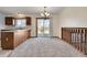 Bright dining area with sliding glass doors to the outdoor deck at 1244 S Argonne Cir, Aurora, CO 80017