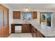 Well-maintained kitchen with ample counter space and modern appliances at 1244 S Argonne Cir, Aurora, CO 80017