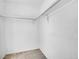 Walk-in closet with upper shelving and ample storage space at 1244 S Argonne Cir, Aurora, CO 80017