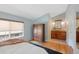Cozy bedroom with ensuite bathroom and lots of natural light at 150 Blue Spruce Ct, Highlands Ranch, CO 80126