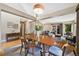 Elegant dining room flows into the cozy living room with backyard access, great for entertaining at 150 Blue Spruce Ct, Highlands Ranch, CO 80126