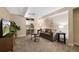 Comfortable living room with plush carpeting, modern furniture, and a TV for a relaxing atmosphere at 150 Blue Spruce Ct, Highlands Ranch, CO 80126