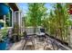 Private patio area with outdoor seating and lush greenery at 150 Blue Spruce Ct, Highlands Ranch, CO 80126