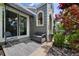 Outdoor patio with sliding glass door and privacy fence at 150 Blue Spruce Ct, Highlands Ranch, CO 80126