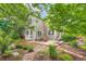 Beautiful backyard featuring a patio with seating and lush landscaping at 10472 Longleaf Dr, Parker, CO 80134