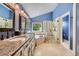 Luxurious bathroom features a soaking tub, walk-in shower, and dual vanities at 10472 Longleaf Dr, Parker, CO 80134