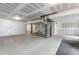 Unfinished basement showcasing mechanical systems and open space, ideal for storage or renovation at 9060 Ferncrest St, Firestone, CO 80504