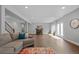 Beautiful finished basement featuring a seating area, wet bar, and stylish decor at 9060 Ferncrest St, Firestone, CO 80504