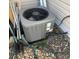 Close up of a well-maintained home air conditioner unit surrounded by gravel and lawn equipment for a comfortable home environment at 15603 E 51St Pl, Denver, CO 80239