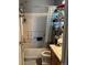 Bathroom with shower/tub combo, sink, toilet and storage shelves at 15603 E 51St Pl, Denver, CO 80239