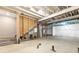 Unfinished basement with exposed beams and concrete floor ready for customization at 821 Boulder Peak Ave, Erie, CO 80516