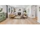 Inviting living room with a cozy fireplace, comfortable seating, and stylish decor at 821 Boulder Peak Ave, Erie, CO 80516