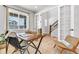 Bright office with French doors, wood floors, and large windows offering a great workspace at 821 Boulder Peak Ave, Erie, CO 80516