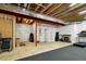 Unfinished basement offering potential for customization with exposed beams at 9915 E 162Nd Pl, Brighton, CO 80602