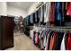 Spacious walk-in closet with ample hanging space, shelves, and room for organization at 9915 E 162Nd Pl, Brighton, CO 80602