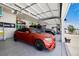 A spacious two car garage with epoxy floors providing parking and storage at 9915 E 162Nd Pl, Brighton, CO 80602