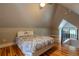 Attic bedroom featuring hardwood floors and a great view of the staircase at 132 Delaware St, Denver, CO 80223