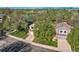 Aerial view of a house featuring lush landscaping, trees, and lawns at 10963 Bryant St, Westminster, CO 80234