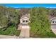 Aerial view of property showing landscaping and driveway at 10963 Bryant St, Westminster, CO 80234