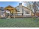 Well-maintained backyard featuring a covered patio and mature landscaping at 10963 Bryant St, Westminster, CO 80234