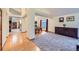 Open living space featuring hardwood and carpet flooring, with plenty of natural light at 10963 Bryant St, Westminster, CO 80234