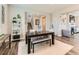 A lovely dining area with modern furnishings, neutral tones, and seamless access to other living spaces at 11902 Norfolk Ct, Commerce City, CO 80022