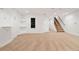 Large, finished basement area featuring recessed lighting, and stairs to the upper floor at 443 Garfield St, Denver, CO 80206