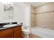 Bathroom featuring granite countertops, updated shower, and tile flooring at 443 Garfield St, Denver, CO 80206