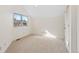 Clean and bright bedroom with modern windows, neutral carpet, and great natural light at 443 Garfield St, Denver, CO 80206