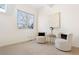 Cozy bedroom featuring a stylish chair arrangement and natural light at 443 Garfield St, Denver, CO 80206