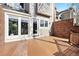 A wooden deck overlooks the yard providing ample outdoor living space at 443 Garfield St, Denver, CO 80206