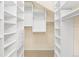 Spacious walk-in closet with custom shelving and storage solutions for optimal organization at 443 Garfield St, Denver, CO 80206